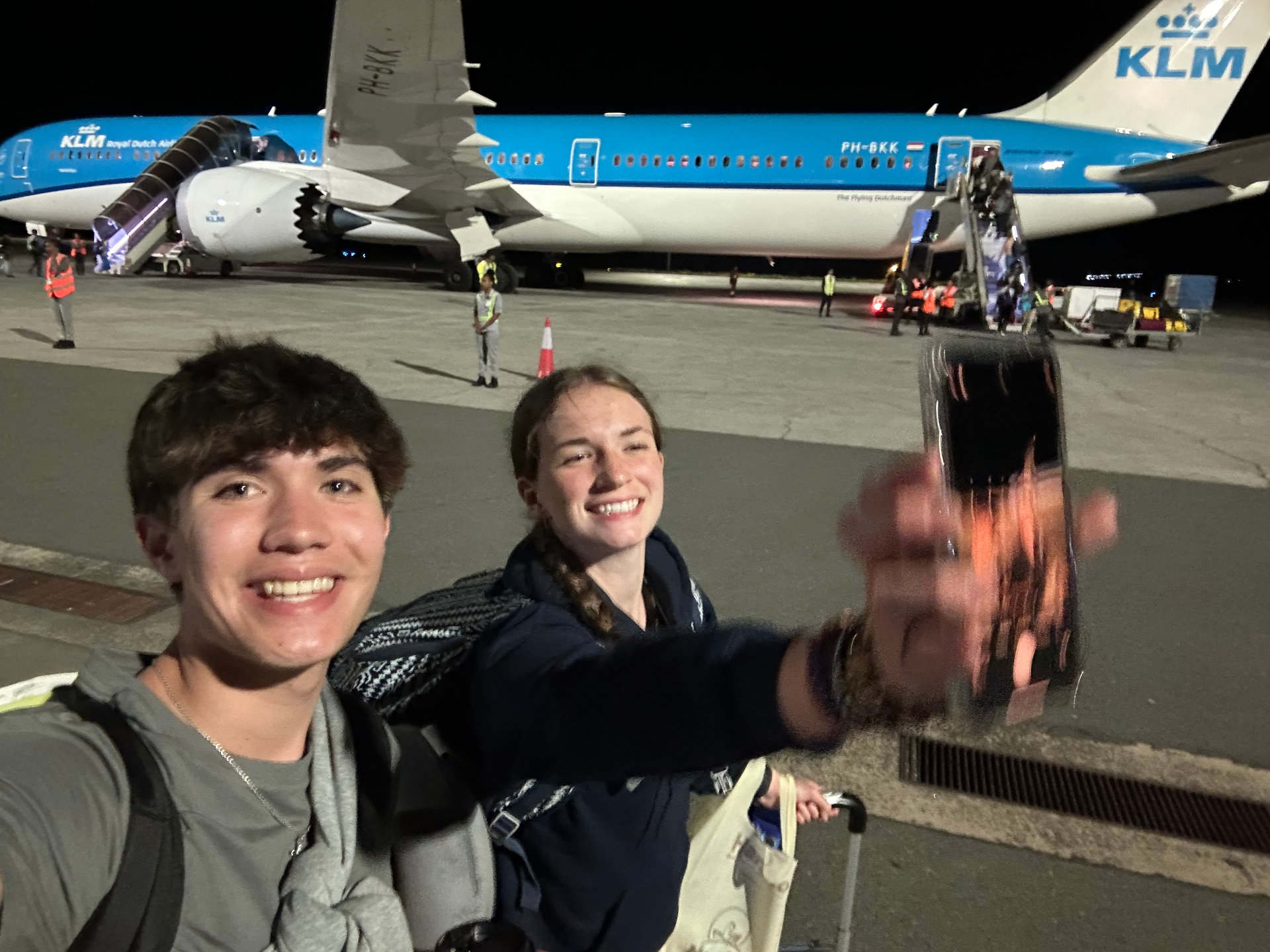 A diverse group of travelers ready for a mission trip